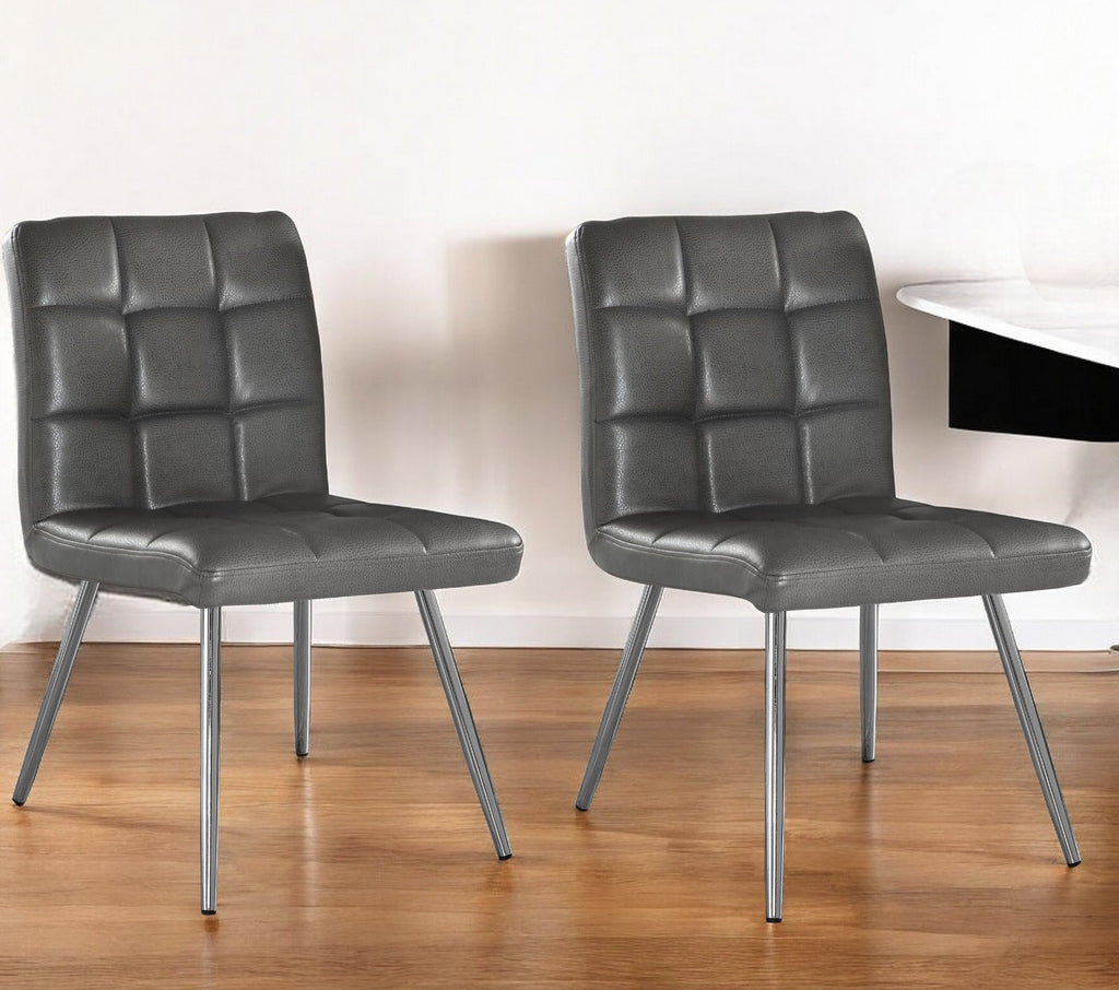 Set of Two Tufted Black And Silver Upholstered Faux Leather Dining Side Chairs