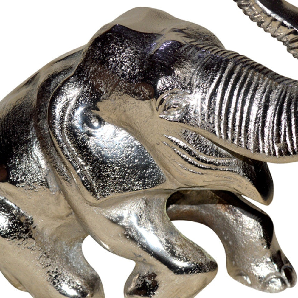 5" X 10" X 8" Silver Aluminum Resting Elephant