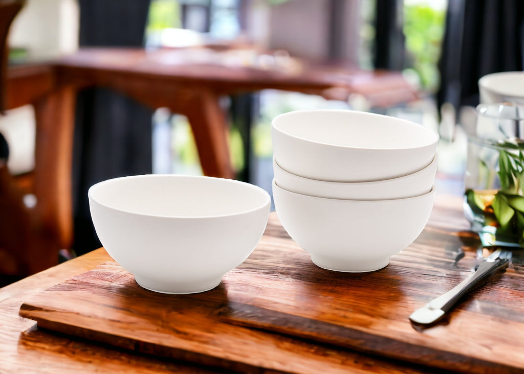 LuxxHomes  White Four Piece Porcelain Service For Four Bowl Set