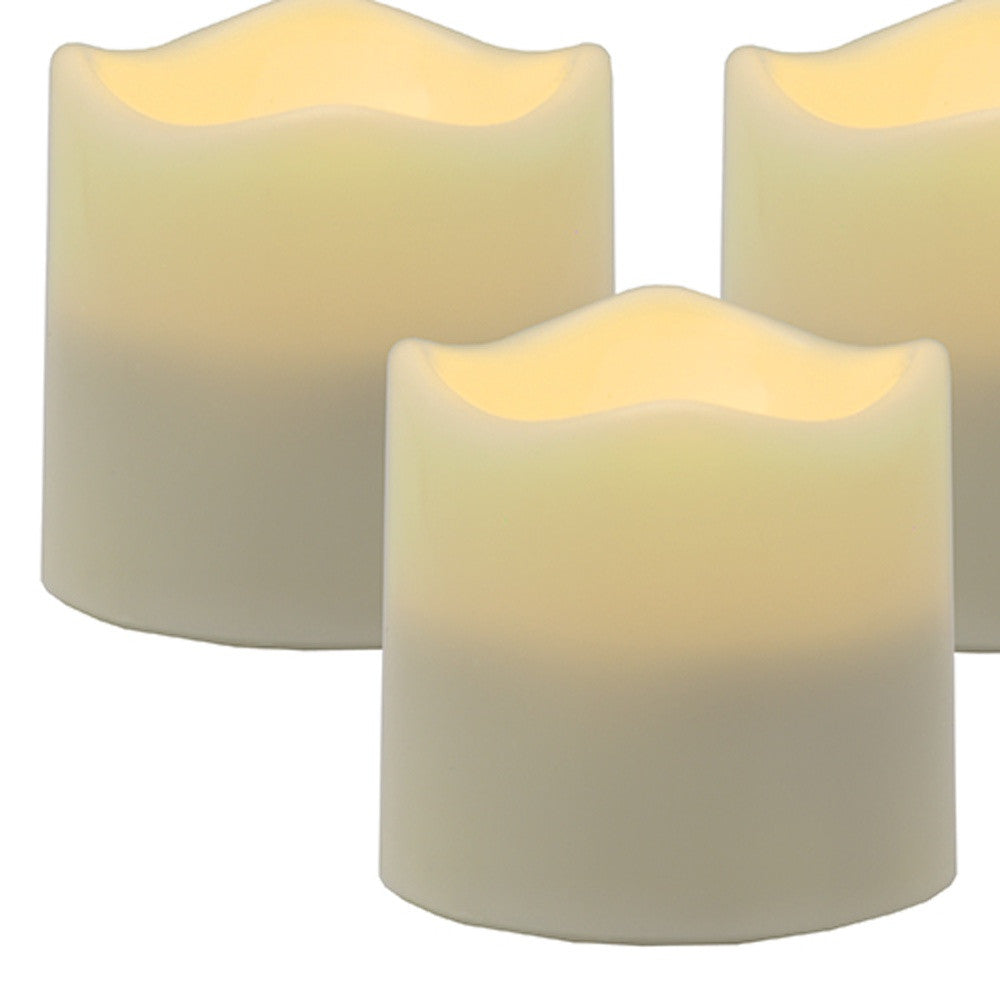 LuxxHomes  Set of Four Ivory Flameless Tealight Candle