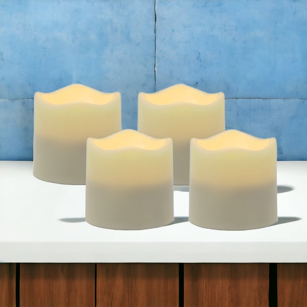 LuxxHomes  Set of Four Ivory Flameless Tealight Candle