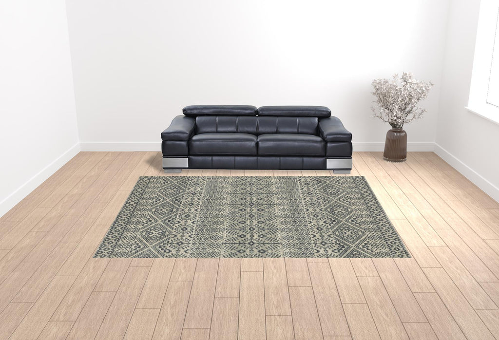 10' X 13' Blue And Beige Geometric Power Loom Stain Resistant Area Rug