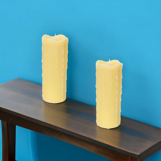 LuxxHomes  Set of Two Yellow Flameless Pillar Candles