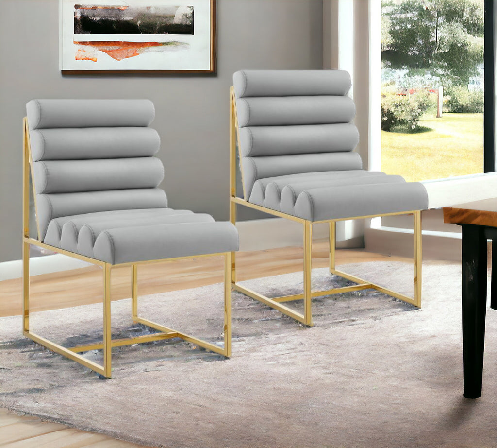 Set of Two Tufted Gray And Gold Upholstered Faux Leather Dining Side Chairs