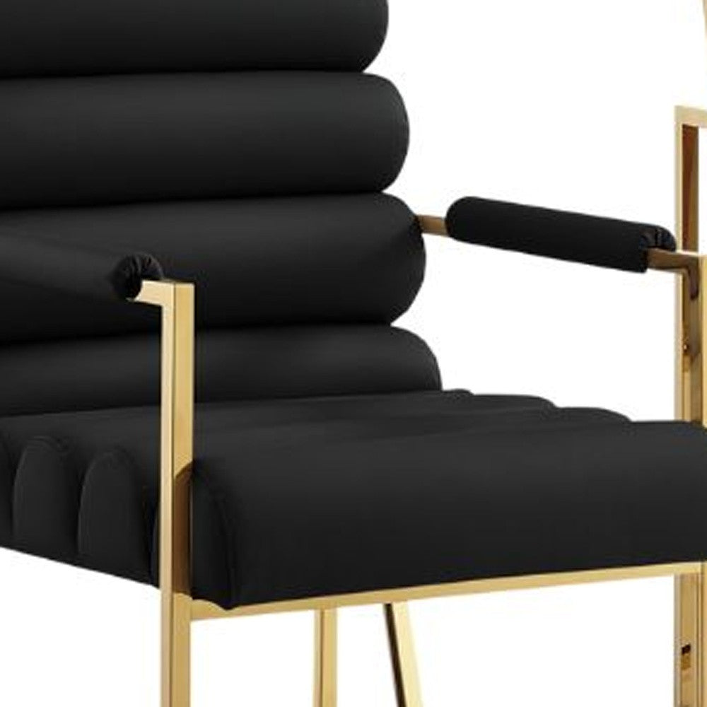 Set of Two Tufted Black And Gold Upholstered Faux Leather Dining Arm Chairs